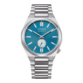Montre Citizen automatique avec cadran bleu et bracelet en métal.